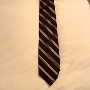 Brooks Brothers. Navy tie with gold and blue stripes.